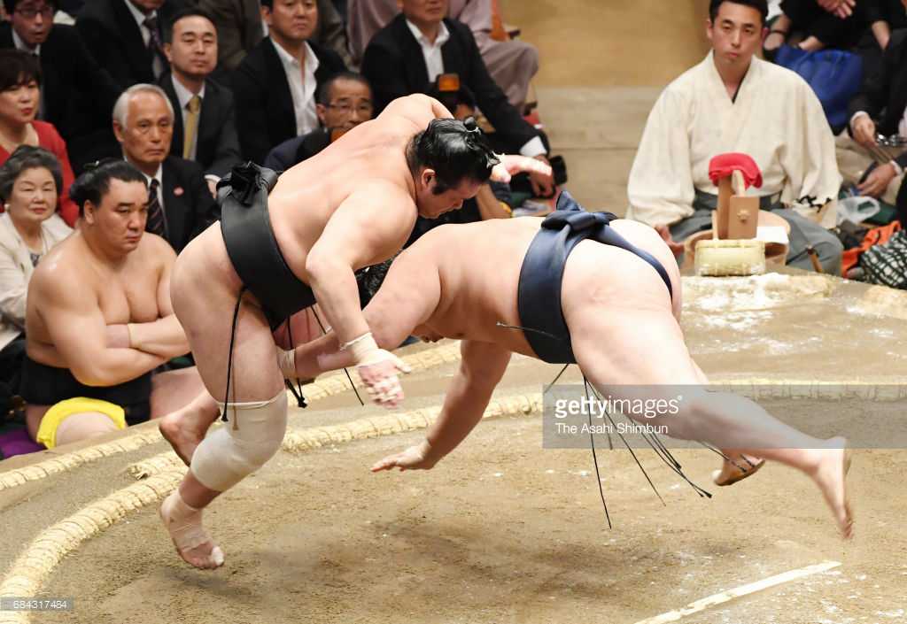 2 yokozuna fall to defeat