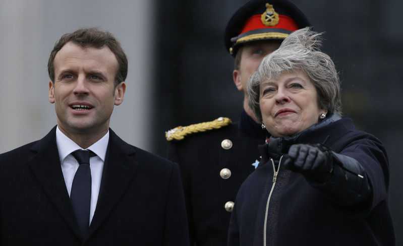 May, Macron reach agreement on border, but not on Brexit