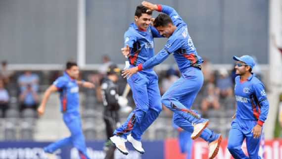 Spinners storm Afghanistan into semi-finals