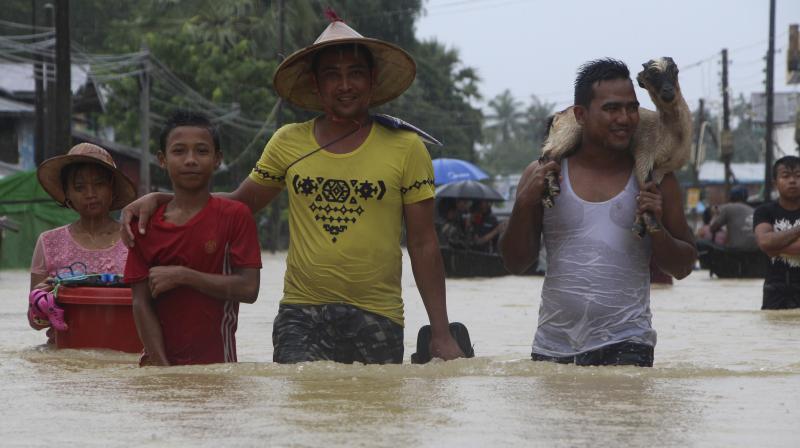 Severe floods in Myanmar kill at least 10, force 54,000 to evacuate homes