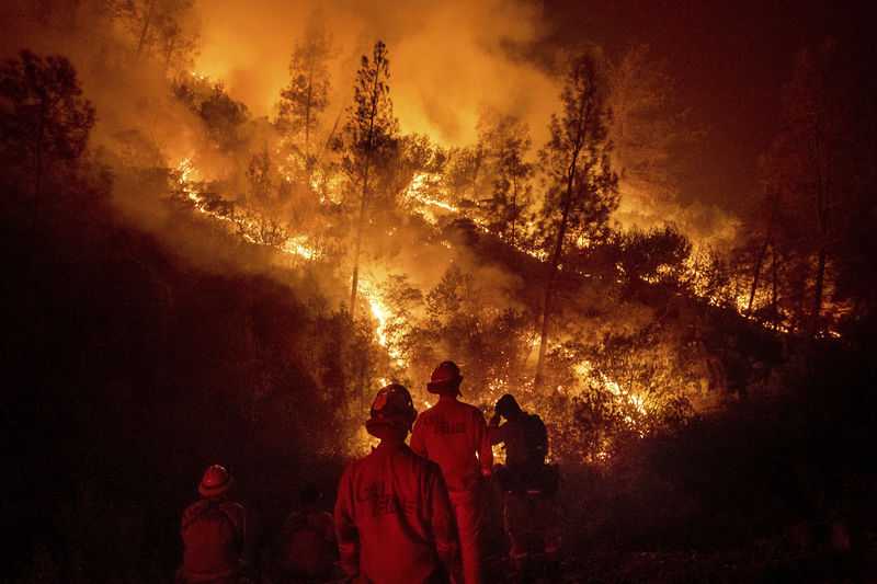14,000 fight California fires, some from prisons or overseas