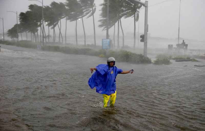 Typhoon pounds south China after killing 64 in Philippines