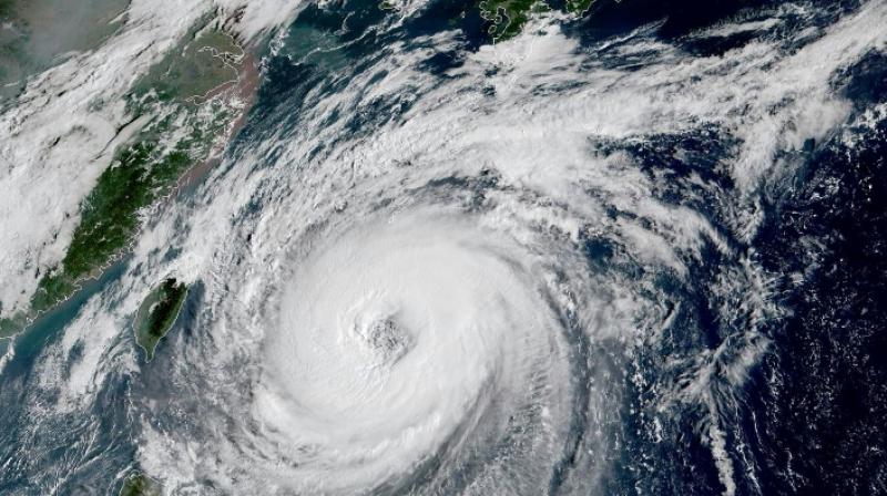 Five injured as powerful typhoon hits Okinawa, nears Japan mainland