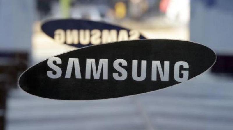 Samsung slashes capex, calls end to chip boom after record third quarter