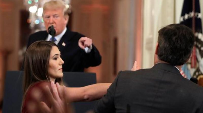 White House bars CNN reporter after ‘heated’ Trump exchange