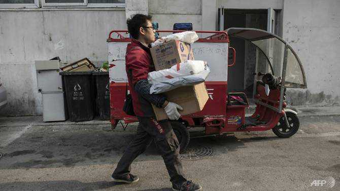 Happiness on three wheels: China's parcel deliverymen