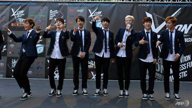 Japan TV station cancels K-pop band BTS performance over nuclear bomb shirt