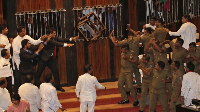 Sri Lankan Parliament adjourned after leaders throw chilli powder, furniture