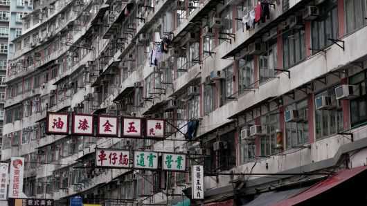 Hong Kong housing prices could fall 25 percent next year if trade war worsens
