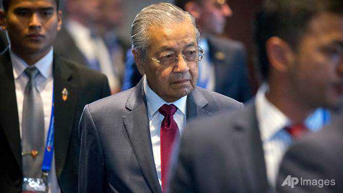 Malaysia 'damage control' report to be released next year: Mahathir
