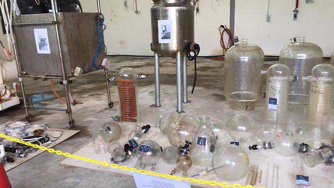 4 policemen among those arrested in raid on Malaysia drug lab
