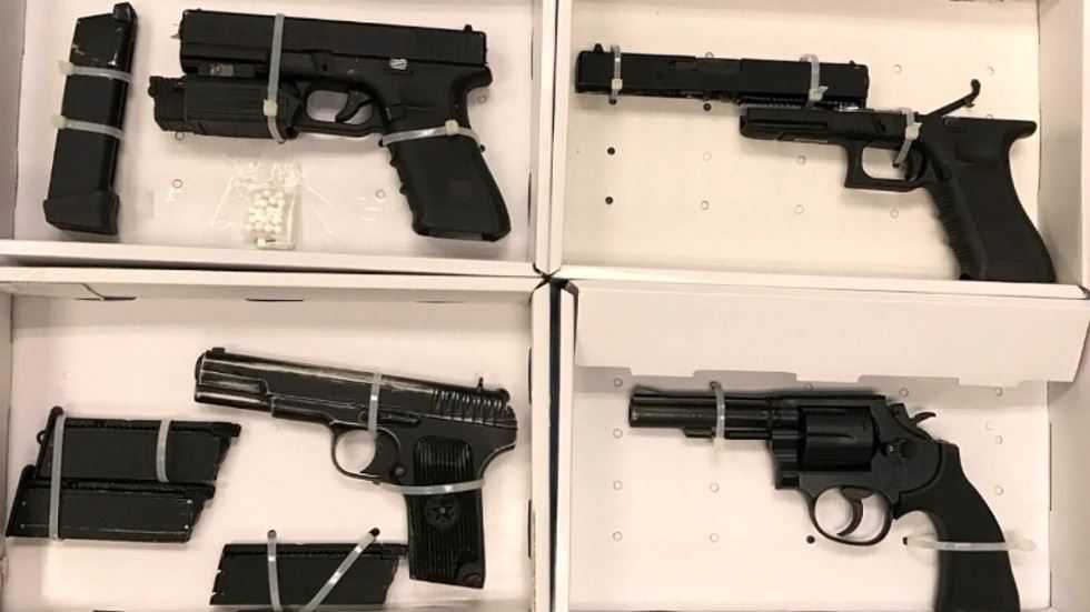 Police raid on Hong Kong gangs seize 700 ammunition rounds, imitation firearms