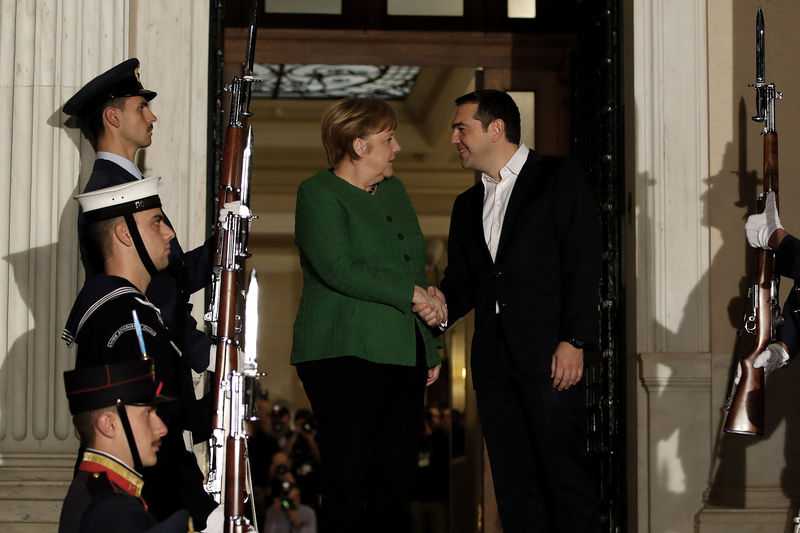 Greece, Germany put past tension behind them as Merkel visits