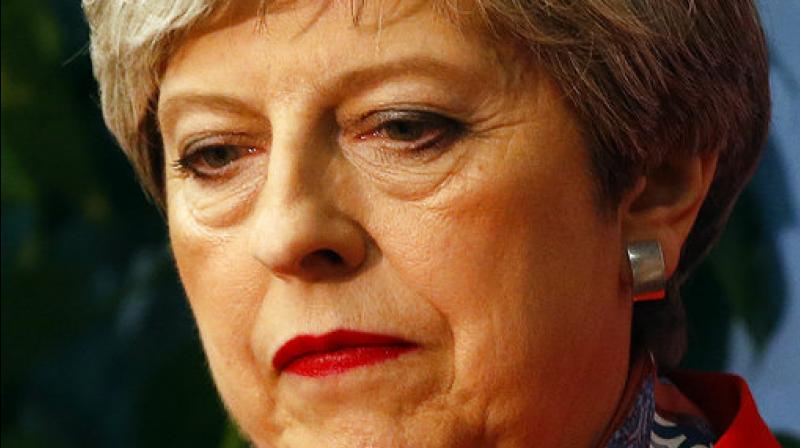 'Humiliated': British press says Theresa May 'crushed' by defeat