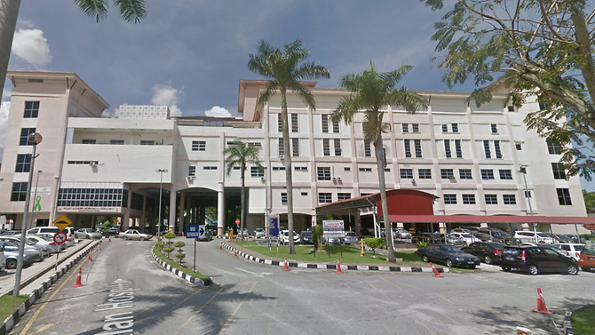 Malaysia man arrested for slapping doctor who refused to give wife MC