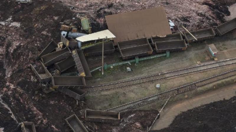 Dam collapse in Brazil kills 9 people, around 300 missing
