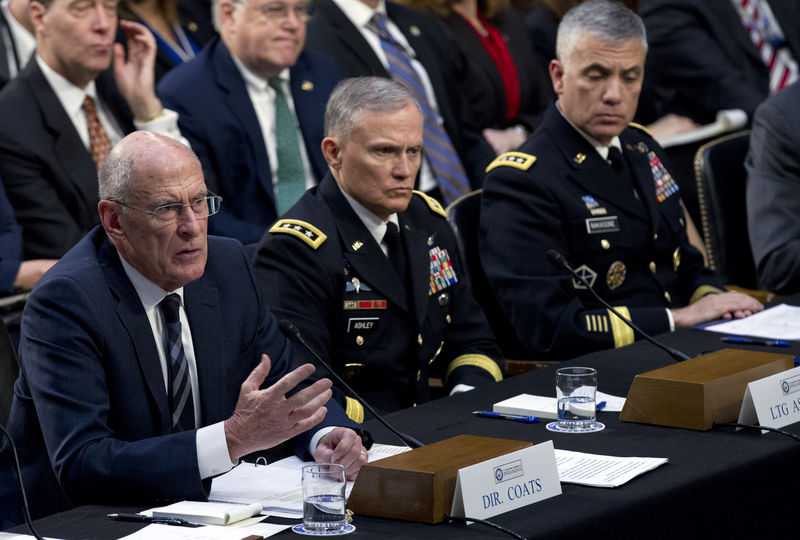 U.S. intelligence heads differ with Trump on security risks
