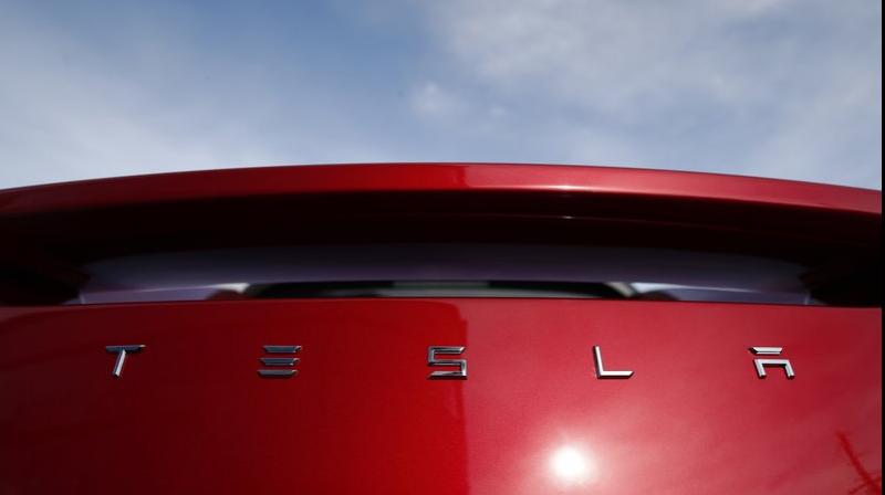 Tesla CFO leaves as automaker promises profits and cheaper cars