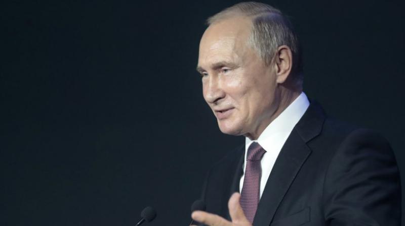 Putin says Russia exiting missile treaty in response to US move