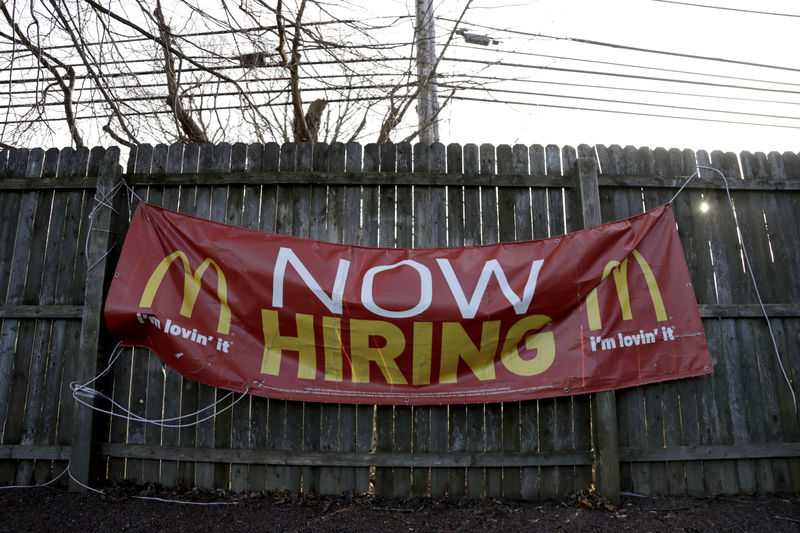 U.S. job gains surge despite cautious Fed