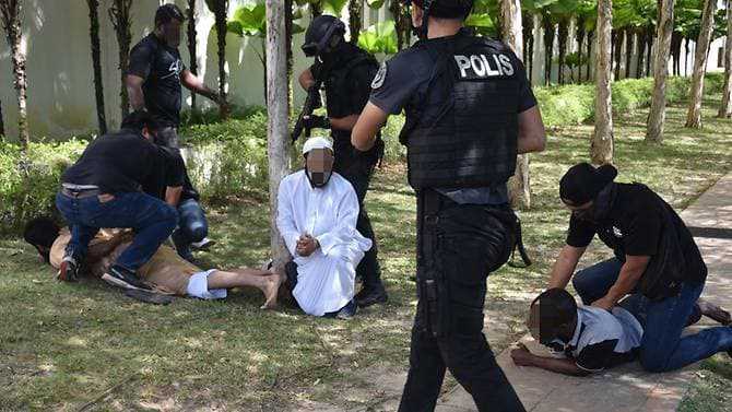 Malaysia on alert after arrests of 9 terror suspects, including foreigners
