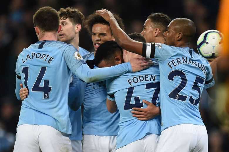 Manchester City beat Cardiff to return to Premier League summit