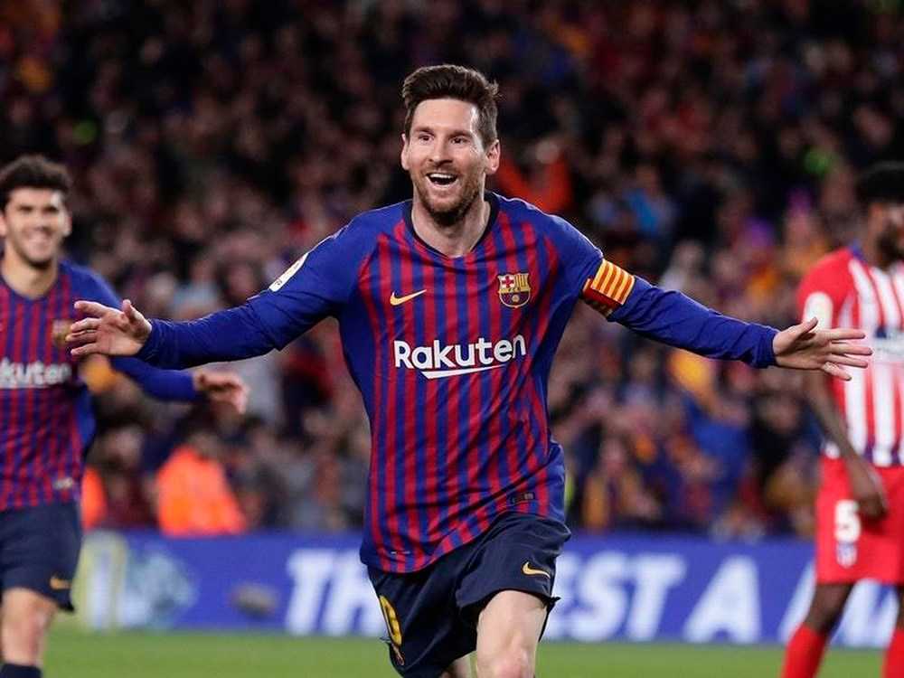 Messi, Suarez lead Barca past 10-man Atletico to boost lead