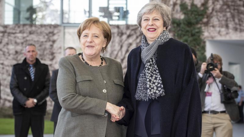 Theresa May to request Merkel, Macron for Brexit delay