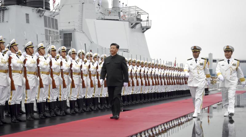 Xi Jinping shows off new missile destroyers in China's naval parade
