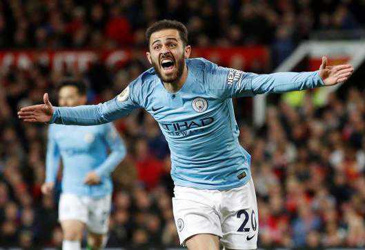 Manchester City take big step towards title with derby win