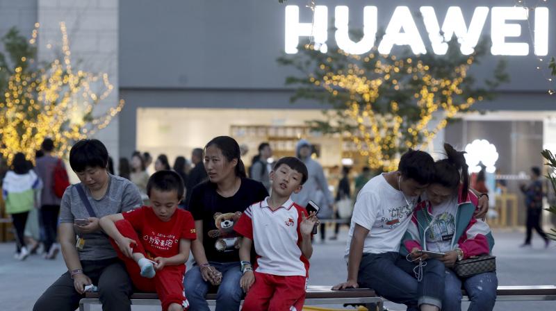 Some big tech firms cut employees' access to Huawei