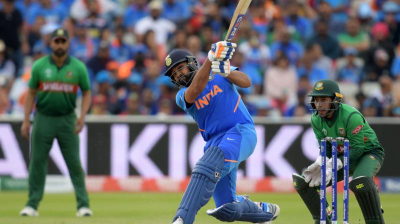 ICC CWC'19: Rohit Sharma, Jasprit Bumrah propel India into semi-finals