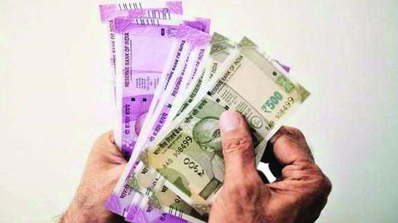 Rupee slips 4 paise against dollar in early trade