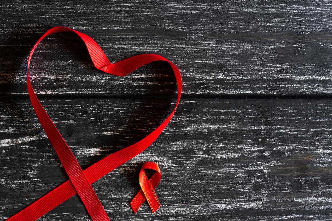 What chronic illnesses are people with HIV more likely to experience?