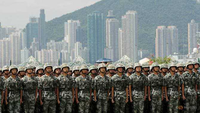 China rotates new batch of troops into Hong Kong as protesters call for democracy