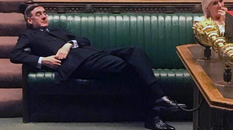UK politician, Brexit backer stretches on front bench amid debate; trolled