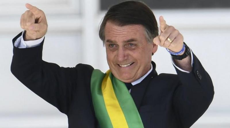 A year after knife attack, Brazil's Bolsonaro undergoes surgery