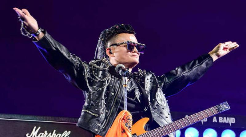 Tearful Jack Ma bids farewell to Alibaba with rock star show