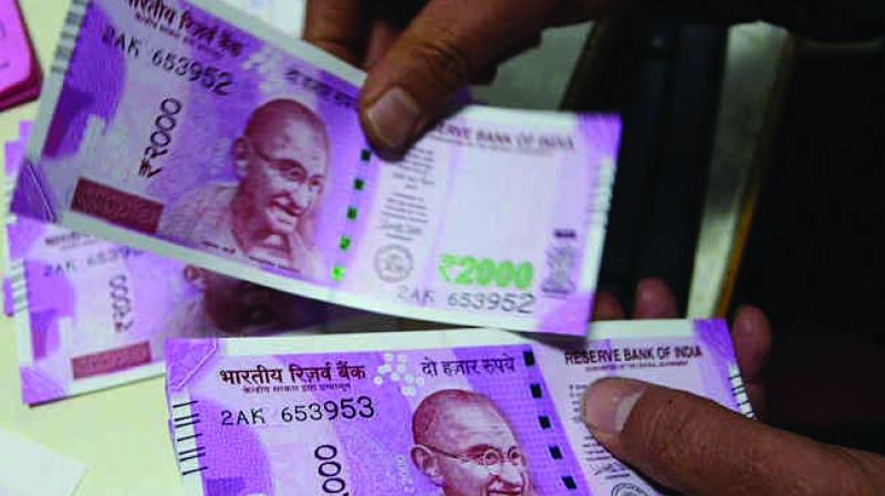 Rupee tumbles 68 paise against dollar in early trade