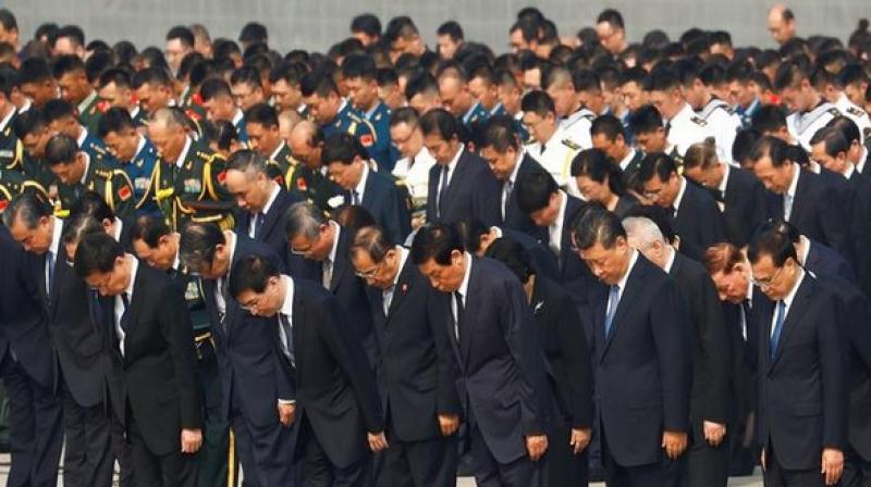 China President Xi Jinping bows to Mao Zedong ahead of National Day celebration