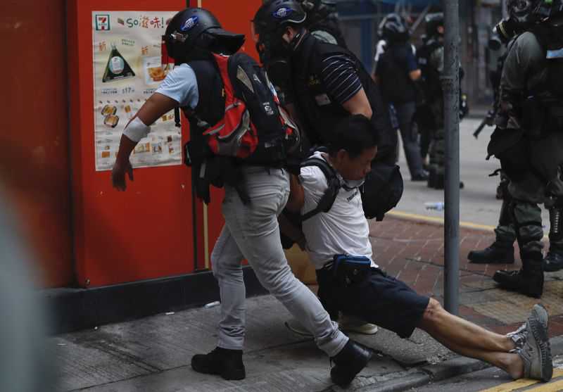 Police shoot protester in Hong Kong with live round