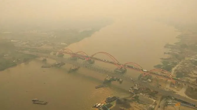 Indonesia shuts some schools as haze again clouds the skies
