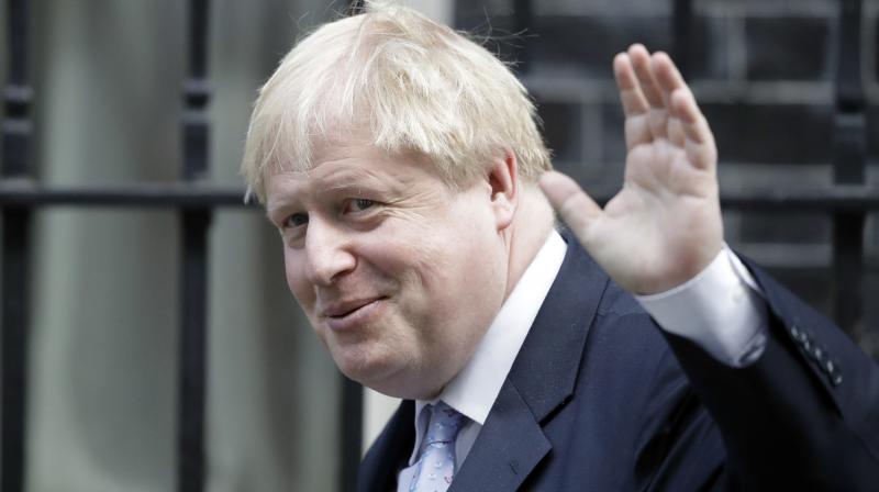 Boris Johnson returns to London to drum up support for Brexit deal