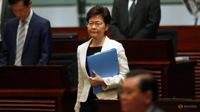 Hong Kong's leader backs police use of force as protesters plan 'illegal' march