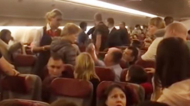 'High’ drama: Flight forced to land after drunk man tries to open door at 33k feet