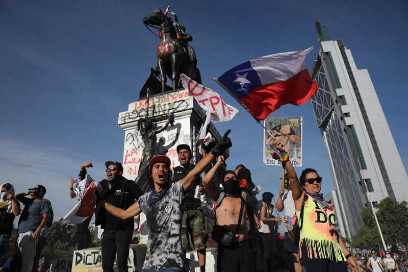 Chile cancels climate, trade summits amid protest chaos