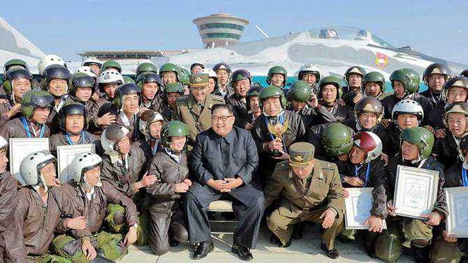 North Korean leader supervises air drills as US and South Korea postpone drills