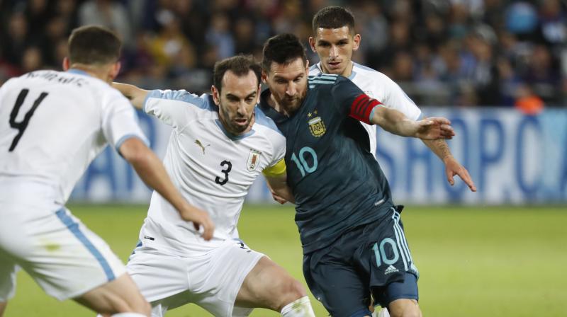 Lionel Messi helps Argentina salvage 2-2 draw against Uruguay