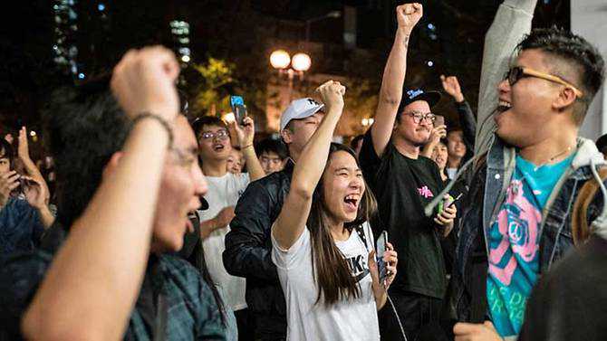 After weeks of violence, Hong Kong votes for district elections