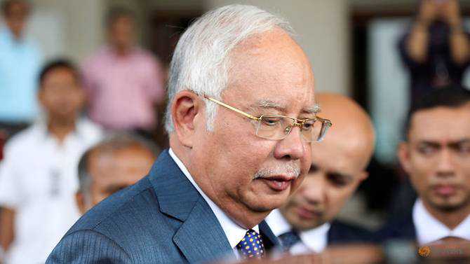 Former Malaysia PM Najib takes stand in 1MDB scandal-linked trial